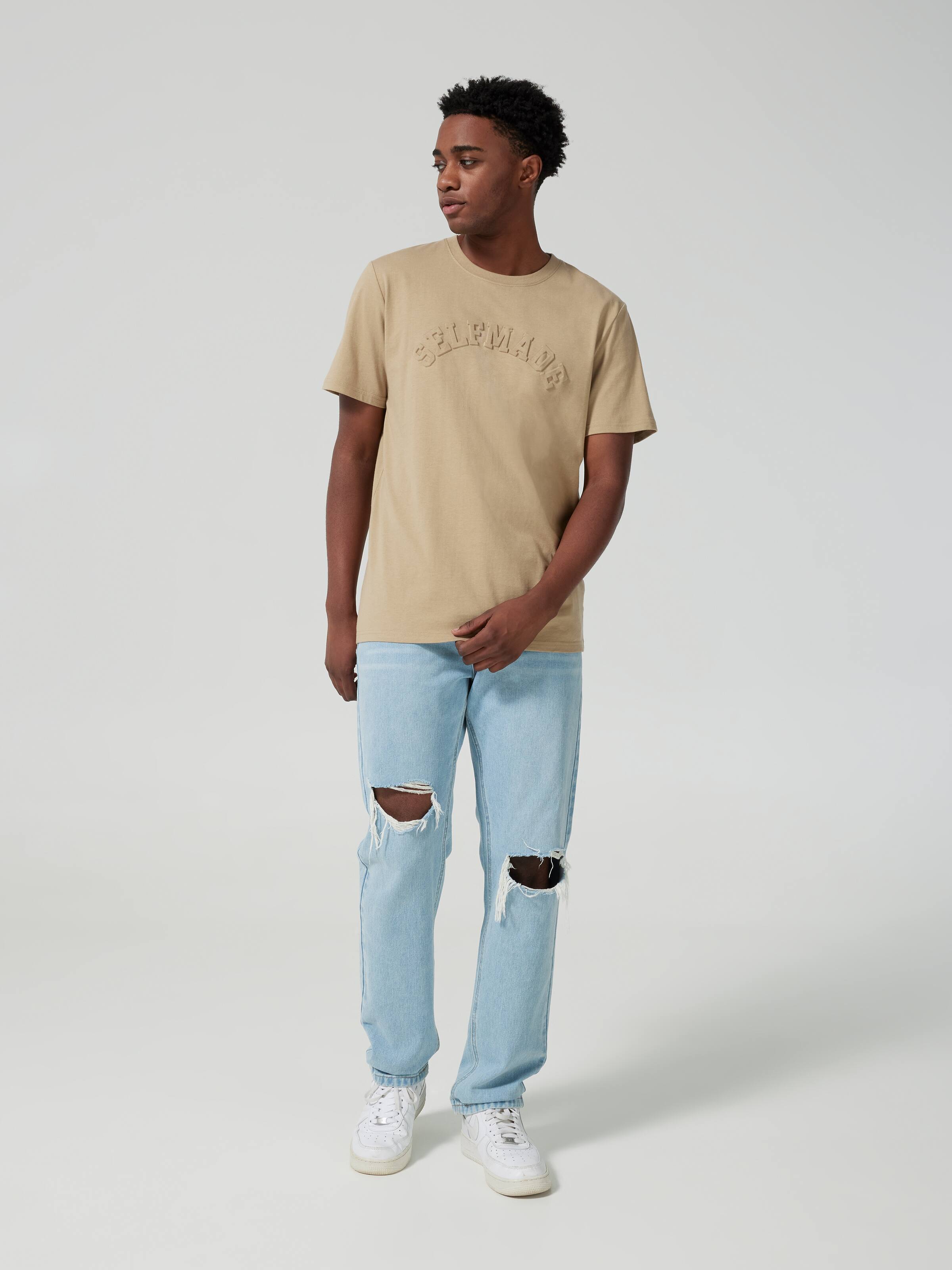 Embossed Self Made Tee