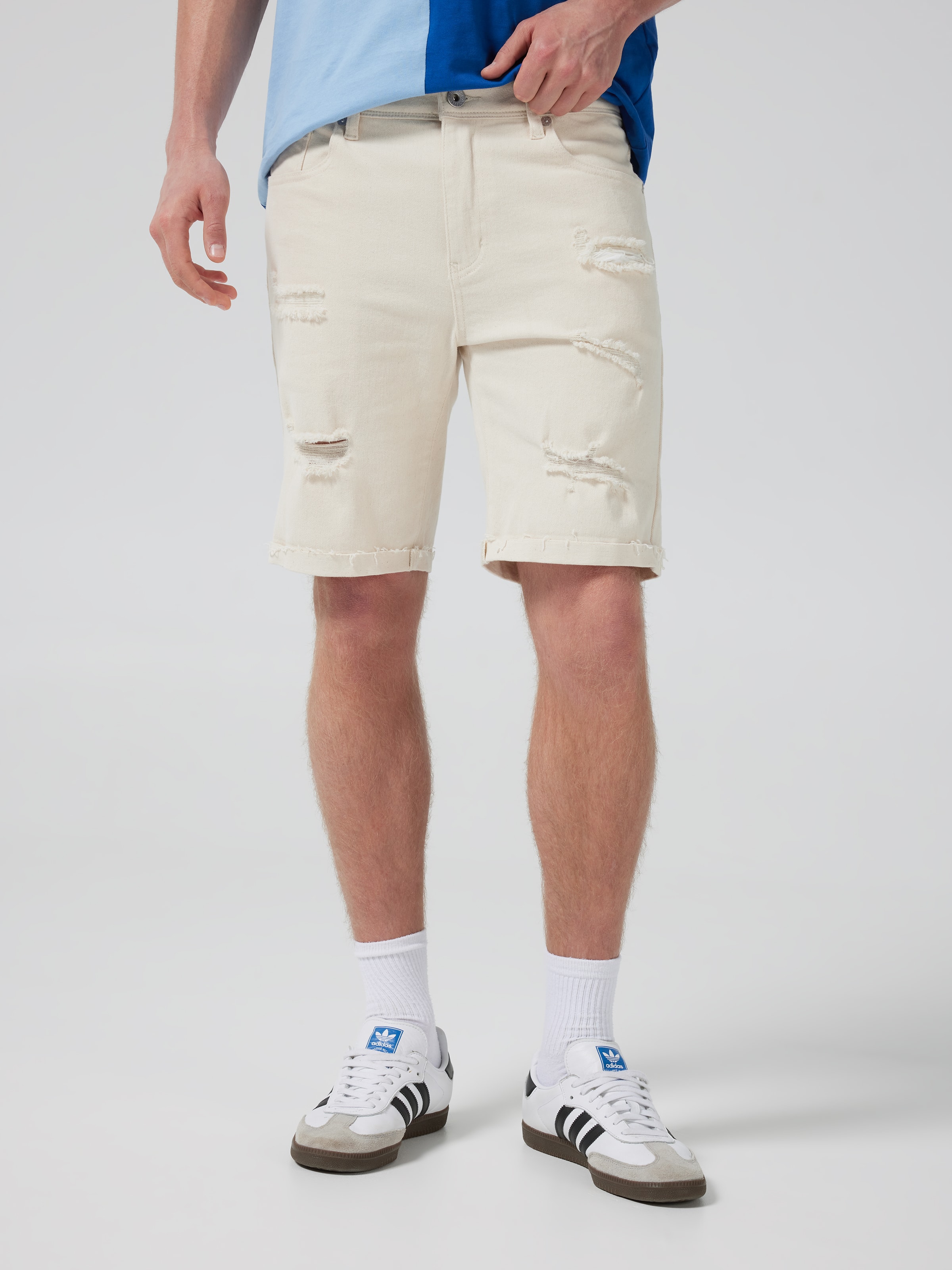 River Slim Ripped Denim
